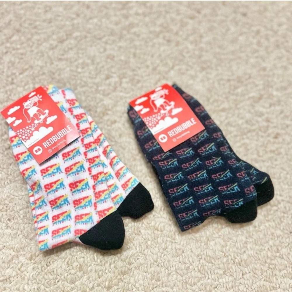 3/$19 NWT Bundle of 2 pair Yes Theory Seek Discomfort all over logo crew socks